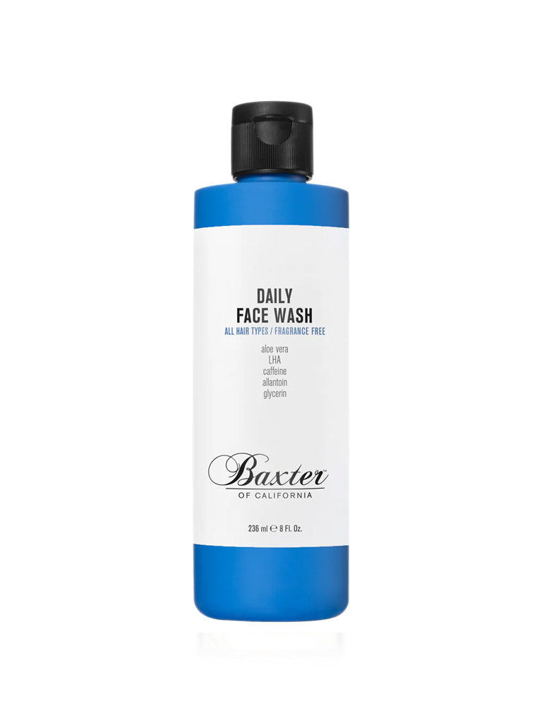 A blue and white bottle of Baxter Daily Face Wash, a sulfate-free, fragrance-free cleanser with black flip-top cap. Suitable for sensitive skin; contains aloe vera, caffeine, allantoin and glycerin.