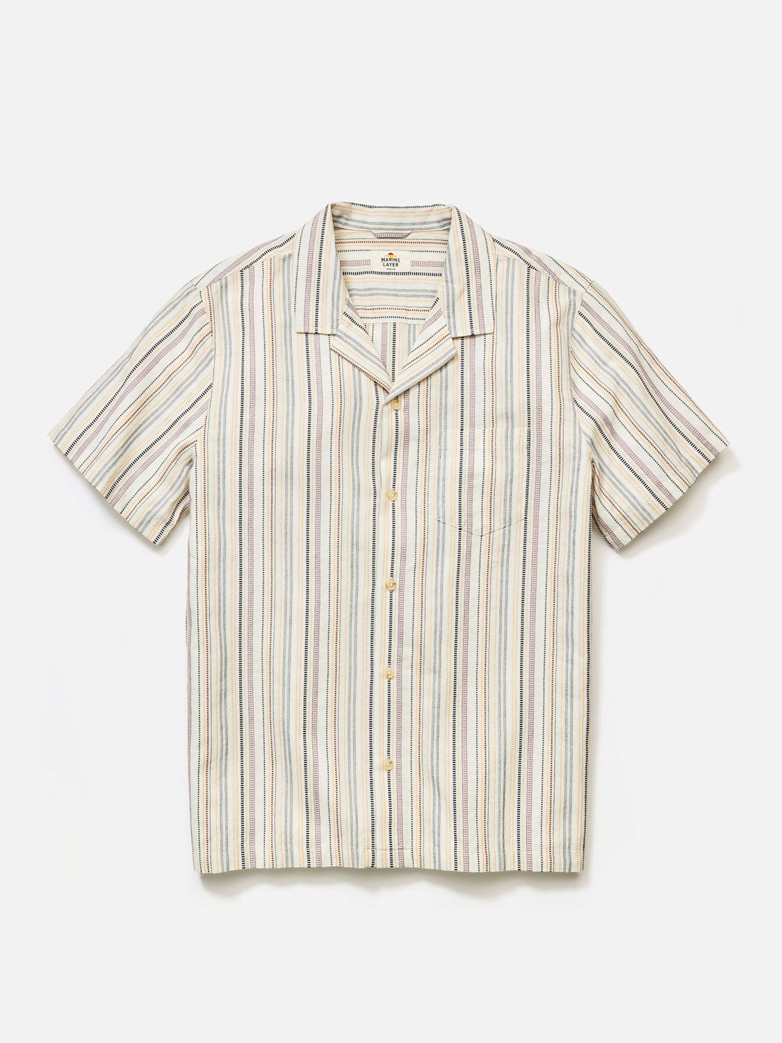 The Marine Layer Dobby Resort Shirt, a vintage style by Marine Layer, is a short-sleeved collared shirt with woven vertical stripes in beige, light blue, and dark brown. Its made of breathable lightweight fabric, featuring a front pocket and button closure against a white backdrop.