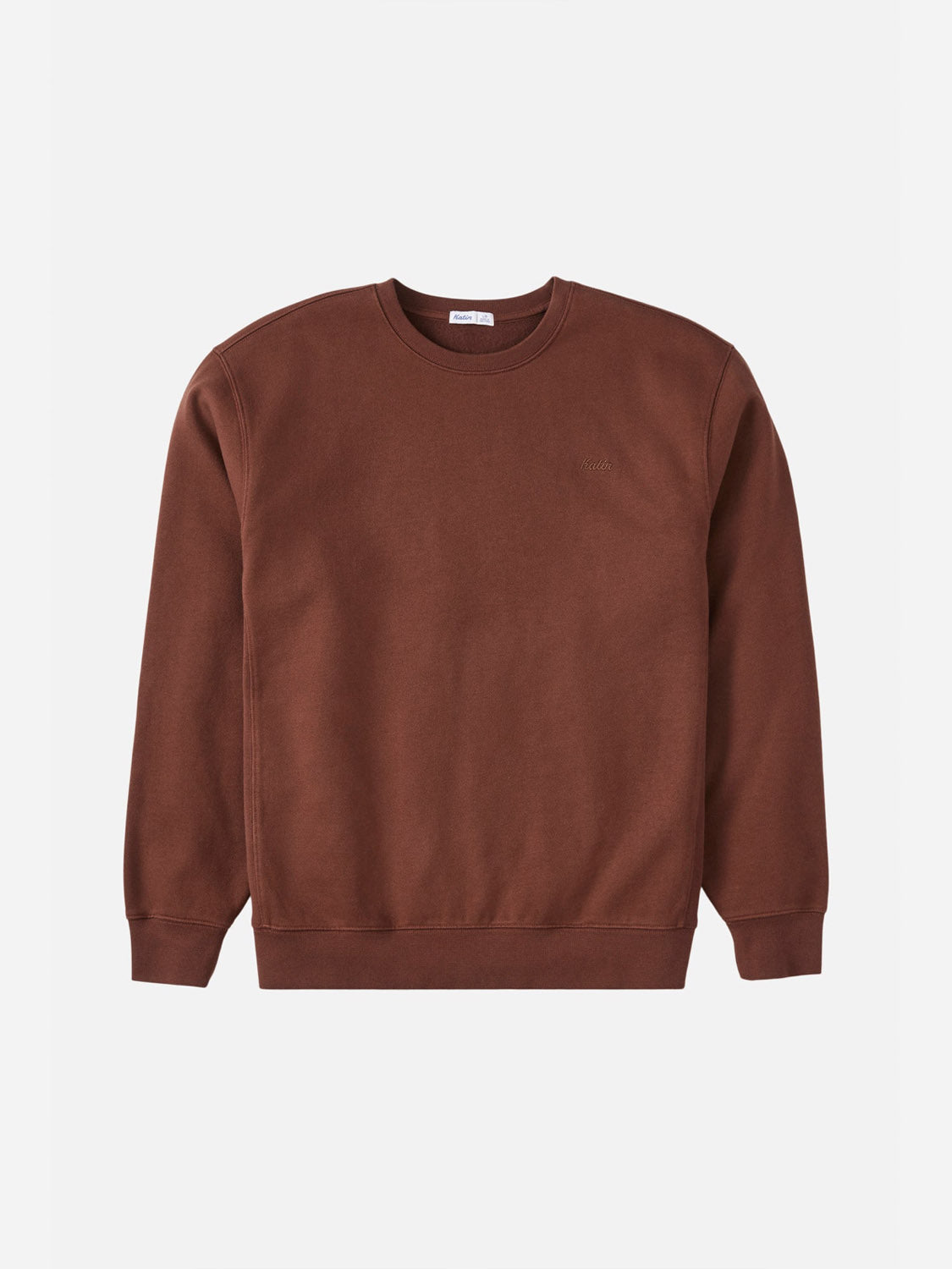 The Katin Embroidered Crewneck is a brown long-sleeve sweatshirt made from soft fleece, shown flat on a white background. It features a relaxed fit with ribbed cuffs, collar, and hem for comfort.