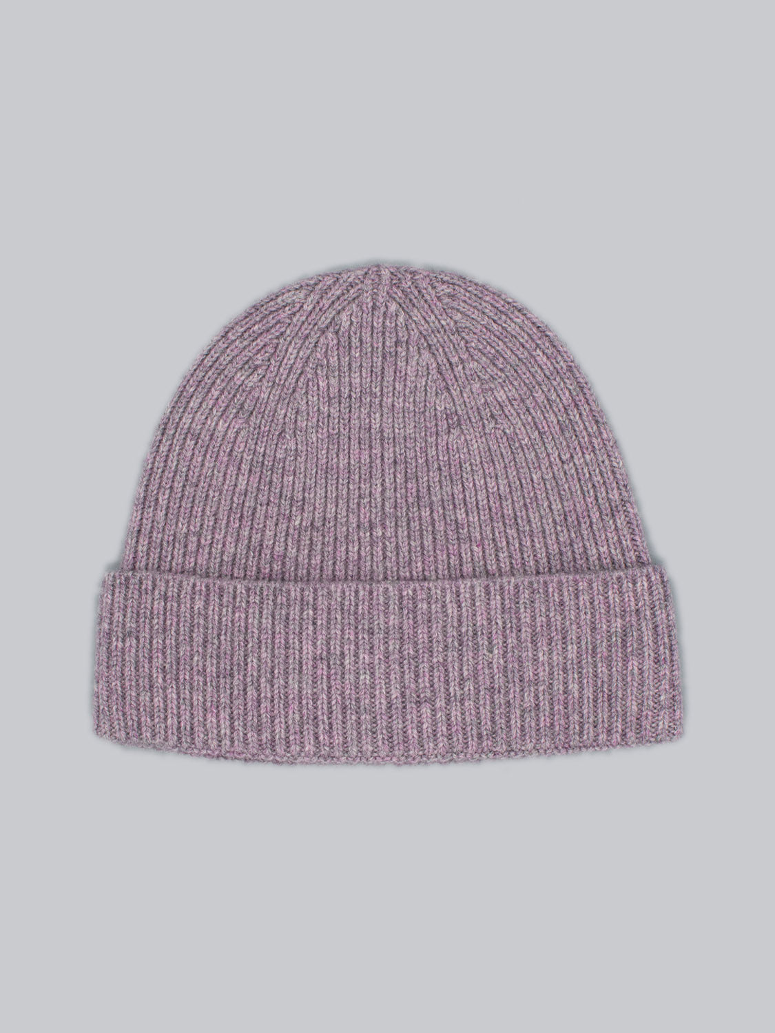 The Fuji Merino Wool Beanie by ID Menswear, in gray and purple with a folded cuff, features a light blue backdrop. Perfect for winter warmth.