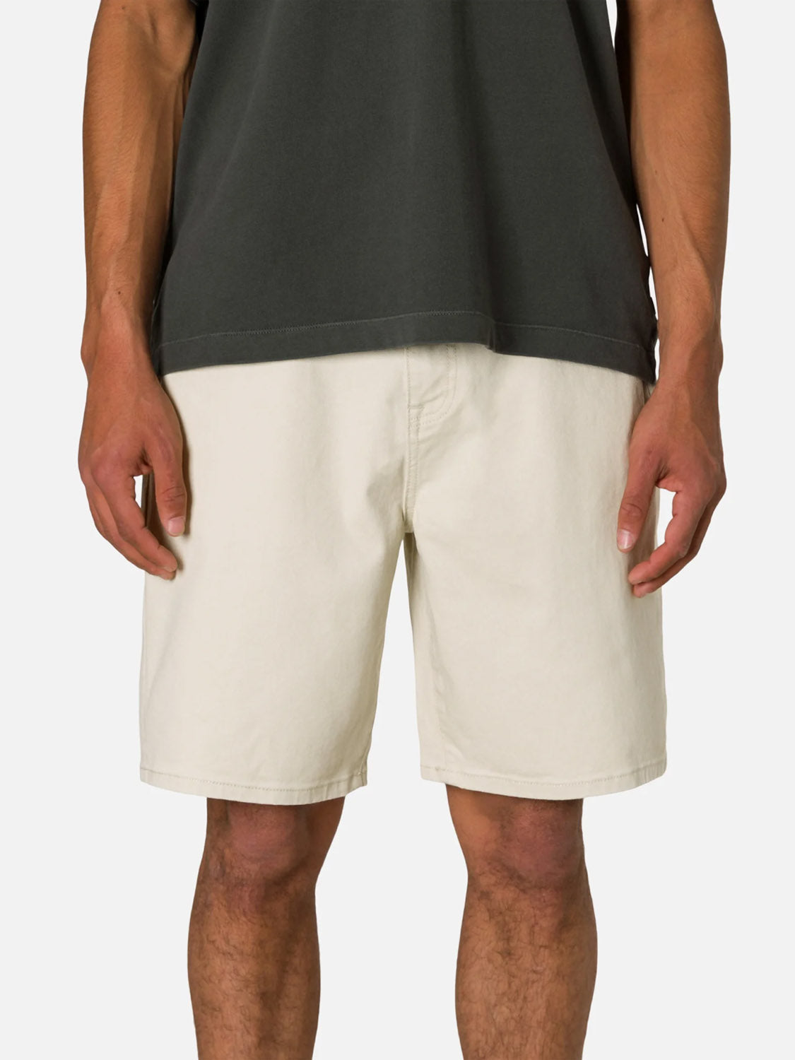 A person wearing Katin's George 64 Bull Denim Short and a dark gray t-shirt is shown from mid-torso to just above the knees, standing against a plain white background.