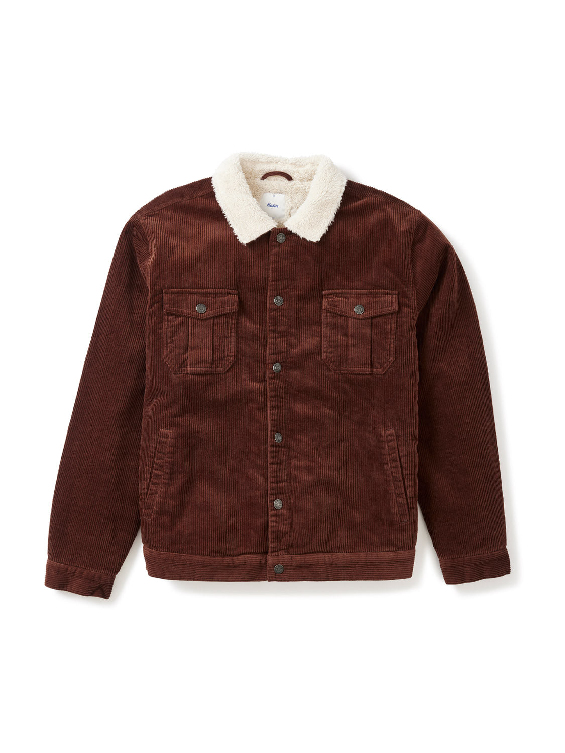The Katin Harris Corduroy Jacket features a brown design with a white sherpa collar and lining, button-up front, and two chest pockets with button flaps, shown laid flat on a white background.
