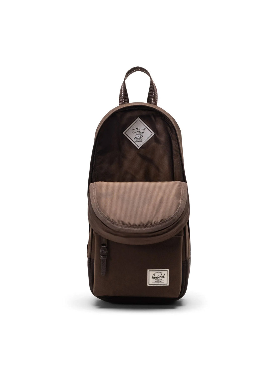 A brown Herschel Heritage Shoulder Bag - 8L, featuring a front zipper pocket, top handle, and white logo patch at the bottom center, made from recycled polyester, displayed against a plain white background.