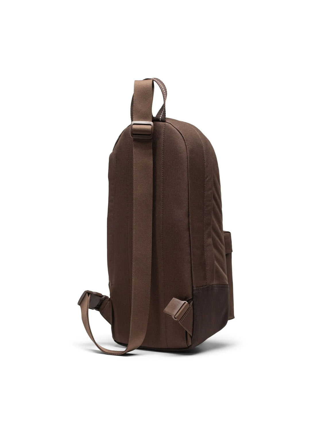 The Herschel Heritage Shoulder Bag - 8L is displayed from the side, highlighting its adjustable straps, top handle, and minimalist design crafted from recycled polyester against a plain white background.