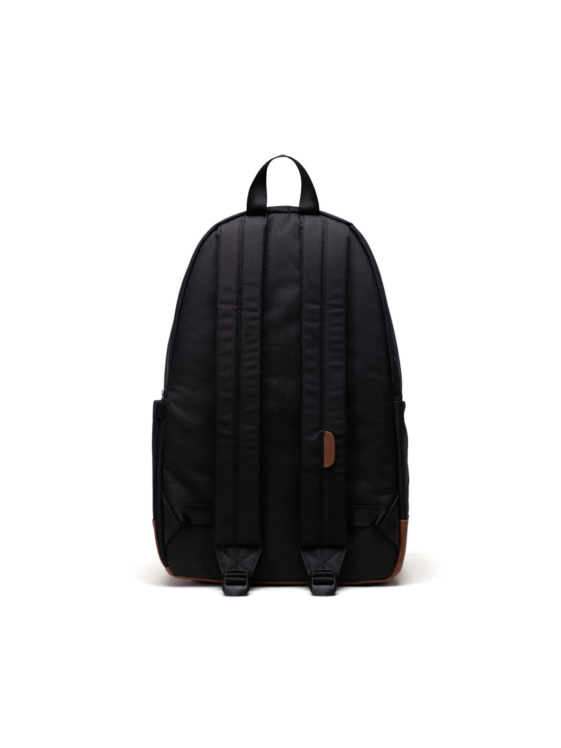 The Herschel Heritage Backpack, shown from the back on a white background, features a black eco-friendly design with two padded shoulder straps, a top handle, and stylish brown accents at the bottom corners.