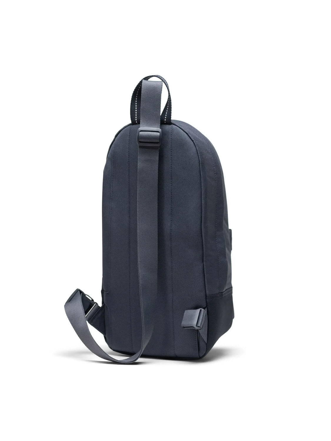 The Herschel Heritage Shoulder Bag - 8L in dark gray, made from recycled polyester, is displayed from the back with an adjustable shoulder strap and top handle against a plain white background.