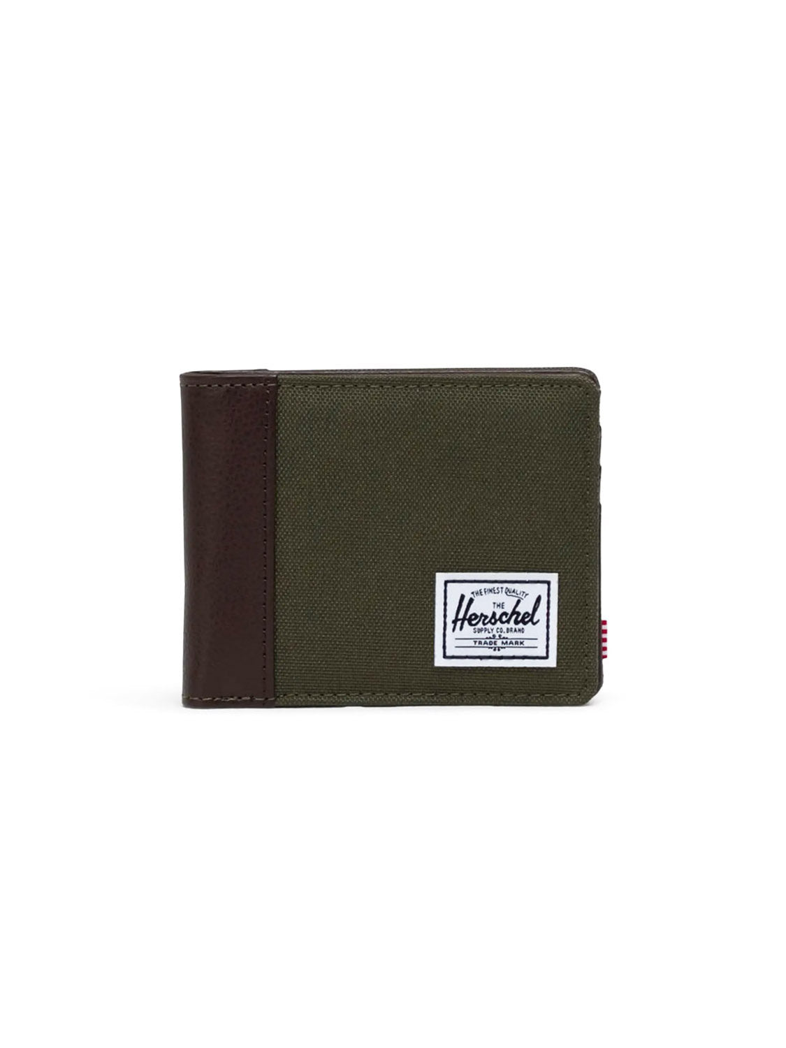 The Herschel Hank Wallet features an olive green fabric body, multiple card slots, a dark brown leather accent on the left edge, and a white rectangular Herschel logo patch on the front.