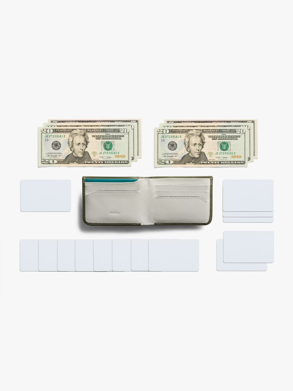The Bellroy Hide and Seek Low Wallet in beige eco-tanned leather sits open on a white surface, surrounded by blank cards and two tidy stacks of U.S. twenty-dollar bills.