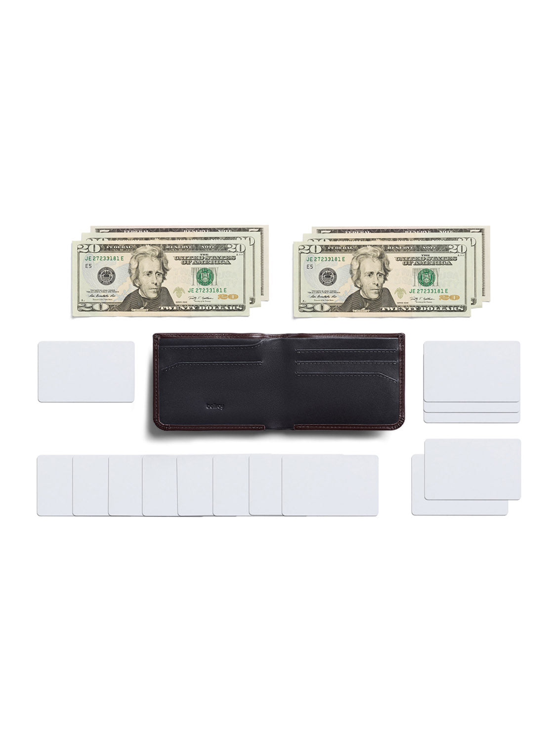 A Bellroy Hide and Seek Low Wallet in black eco-tanned leather lies open and empty with seven blank white cards on each side. Two stacks of U.S. twenty-dollar bills rest above it. The wallet features a hidden coin pouch for added convenience, all set against a plain white background.