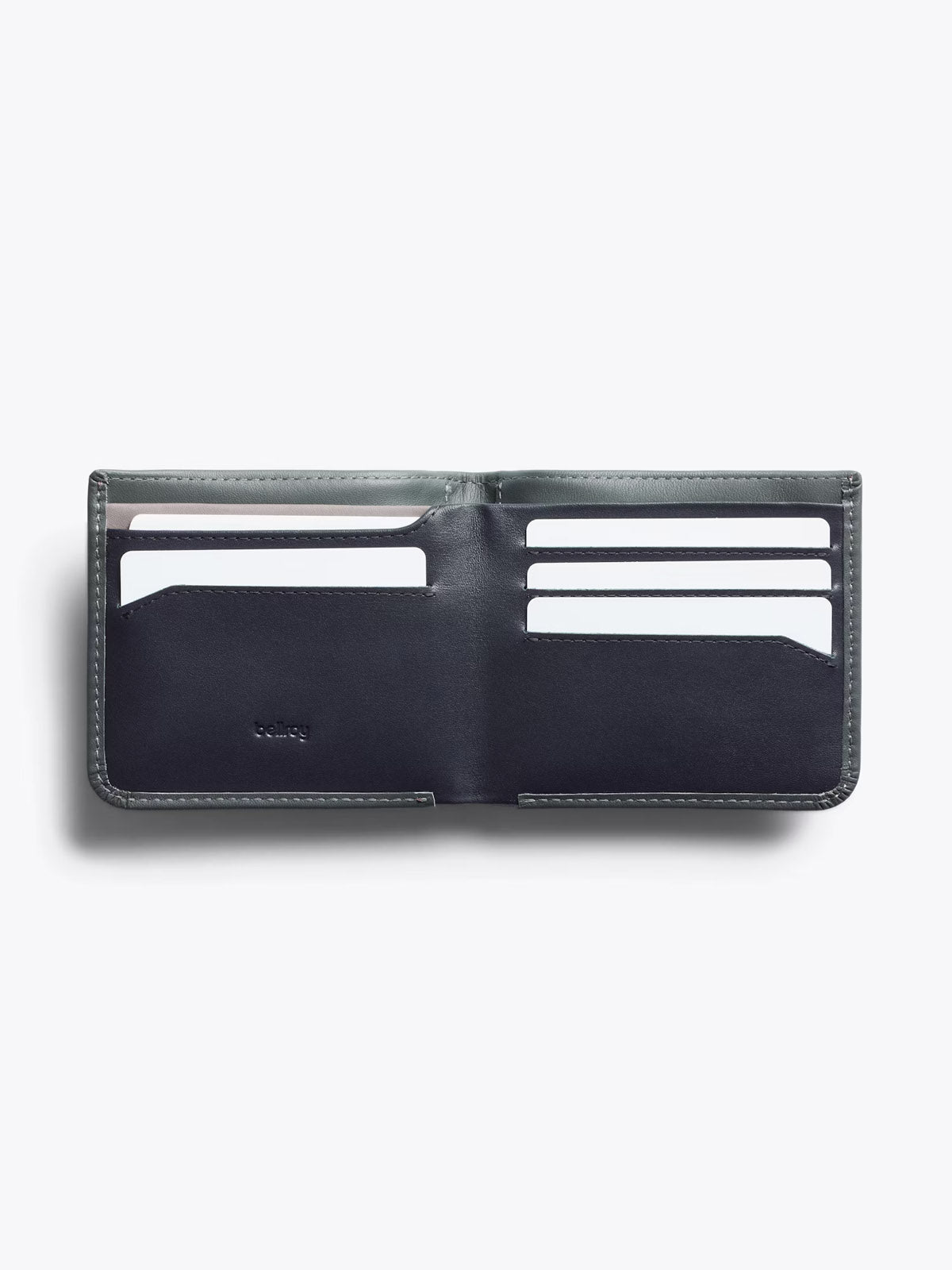The Bellroy Hide and Seek Low Wallet, crafted from eco-tanned black leather, features multiple card slots and compartments and is shown on a plain light background.
