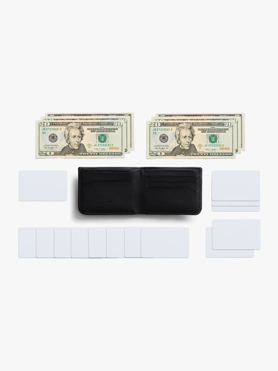 A black Bellroy Hide & Seek Innovera™ Edition wallet is open at the center, surrounded by stacks of $20 bills above and neatly arranged blank white cards below and to each side, all set on a white background. Features RFID protection.