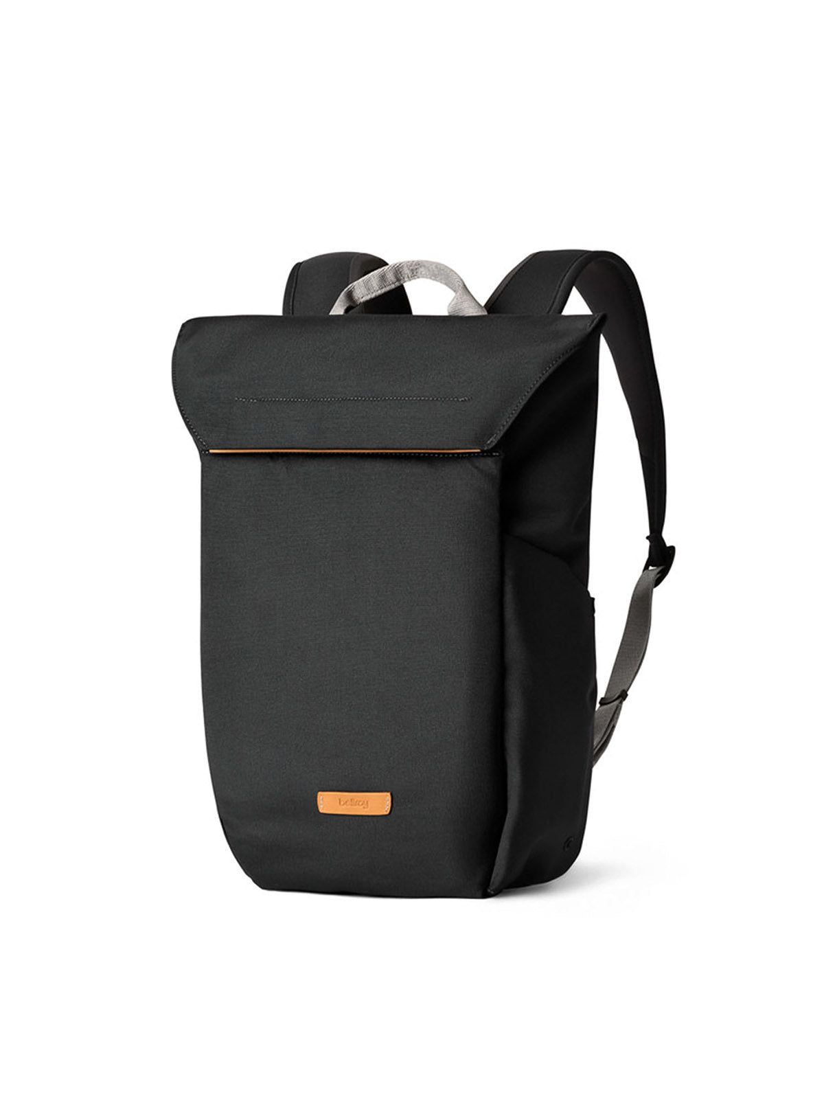 The Bellroy Melbourne Backpack Compact - 13L is a sleek black minimalist bag with a front flap, adjustable shoulder straps, and a small brown leather logo patch near the bottom—ideal for urban professionals.