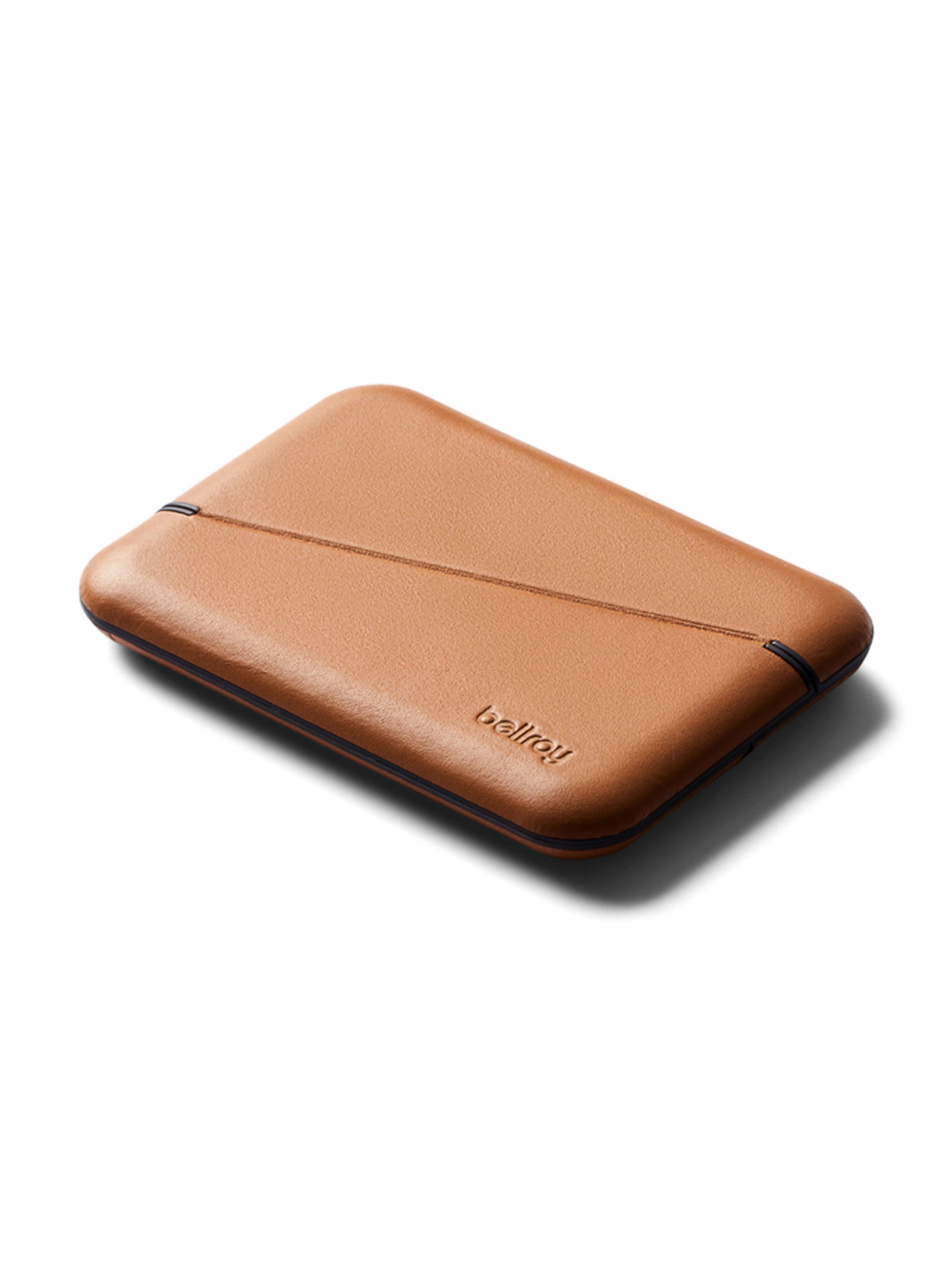 The Bellroy Flip Case Wallet is a slim, rectangular double-sided wallet made from eco-tanned leather, with rounded edges, a diagonal elastic band, and "bellroy" embossed on the surface.