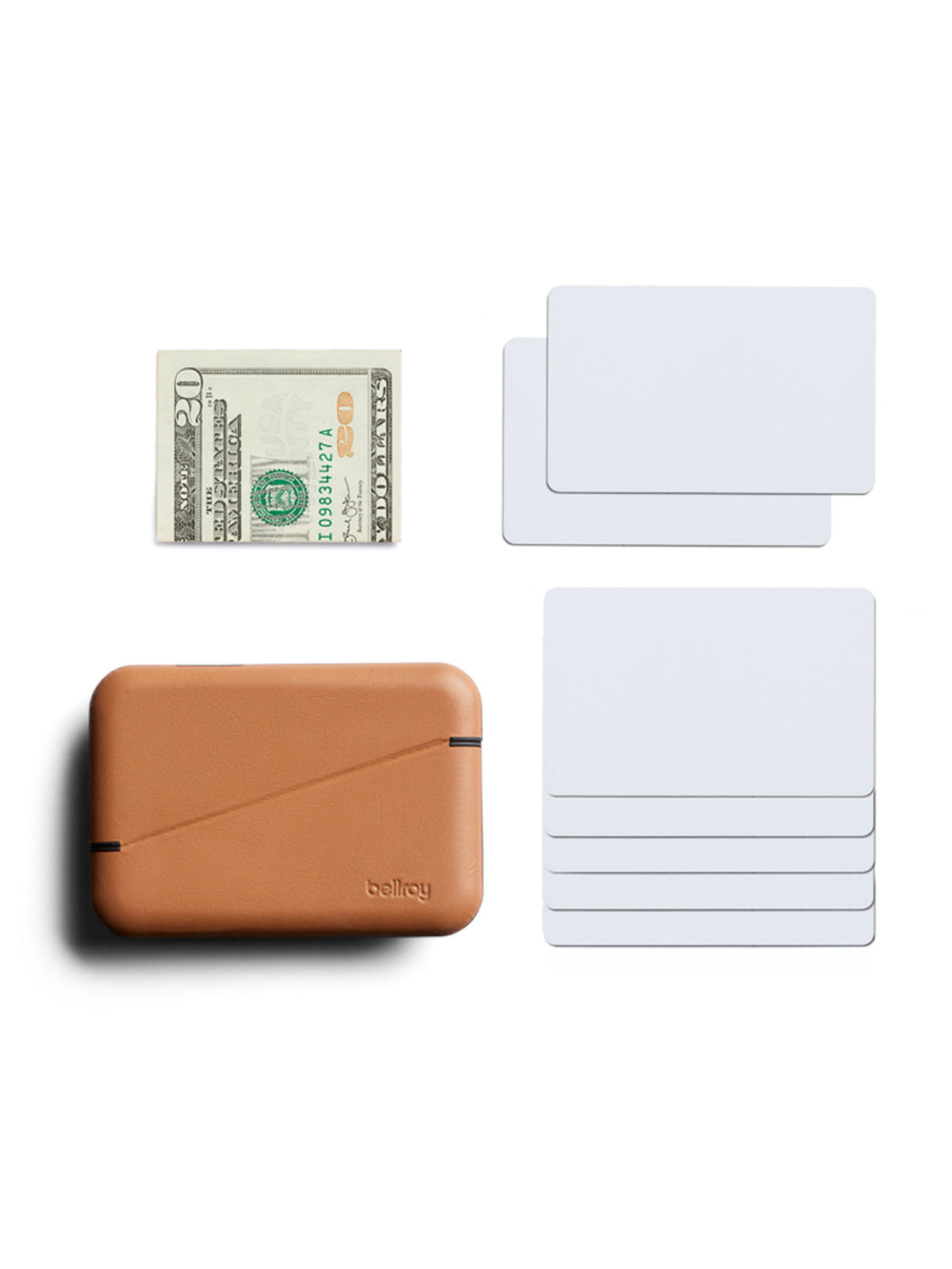 A tan Bellroy Flip Case Wallet made from eco-tanned leather is shown next to a folded $20 bill and seven blank white cards, all neatly arranged on a white background.