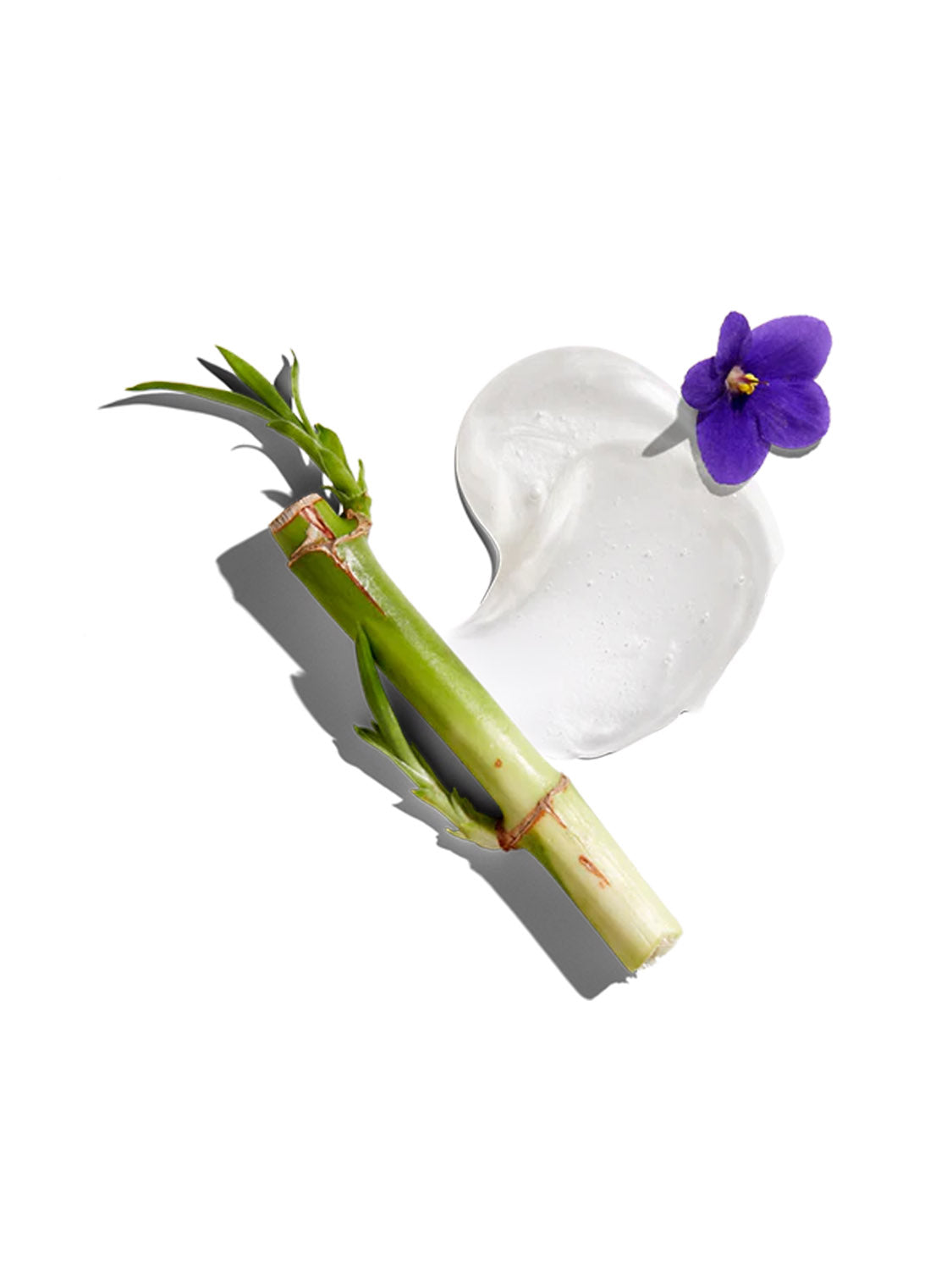 A bamboo stem, clear gel swirl, and purple flower on white evoke the refreshing cleanse of Jack Black's JackZen™ Renewing Body & Hair Cleanser.