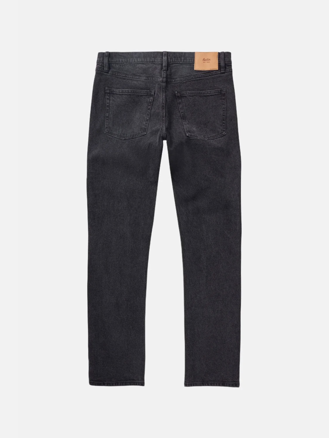 The Katin Jacob 71 Slim Straight Pants in black are displayed from the back, highlighting their classic 5-pocket design and tan leather waistband patch against a plain light background.