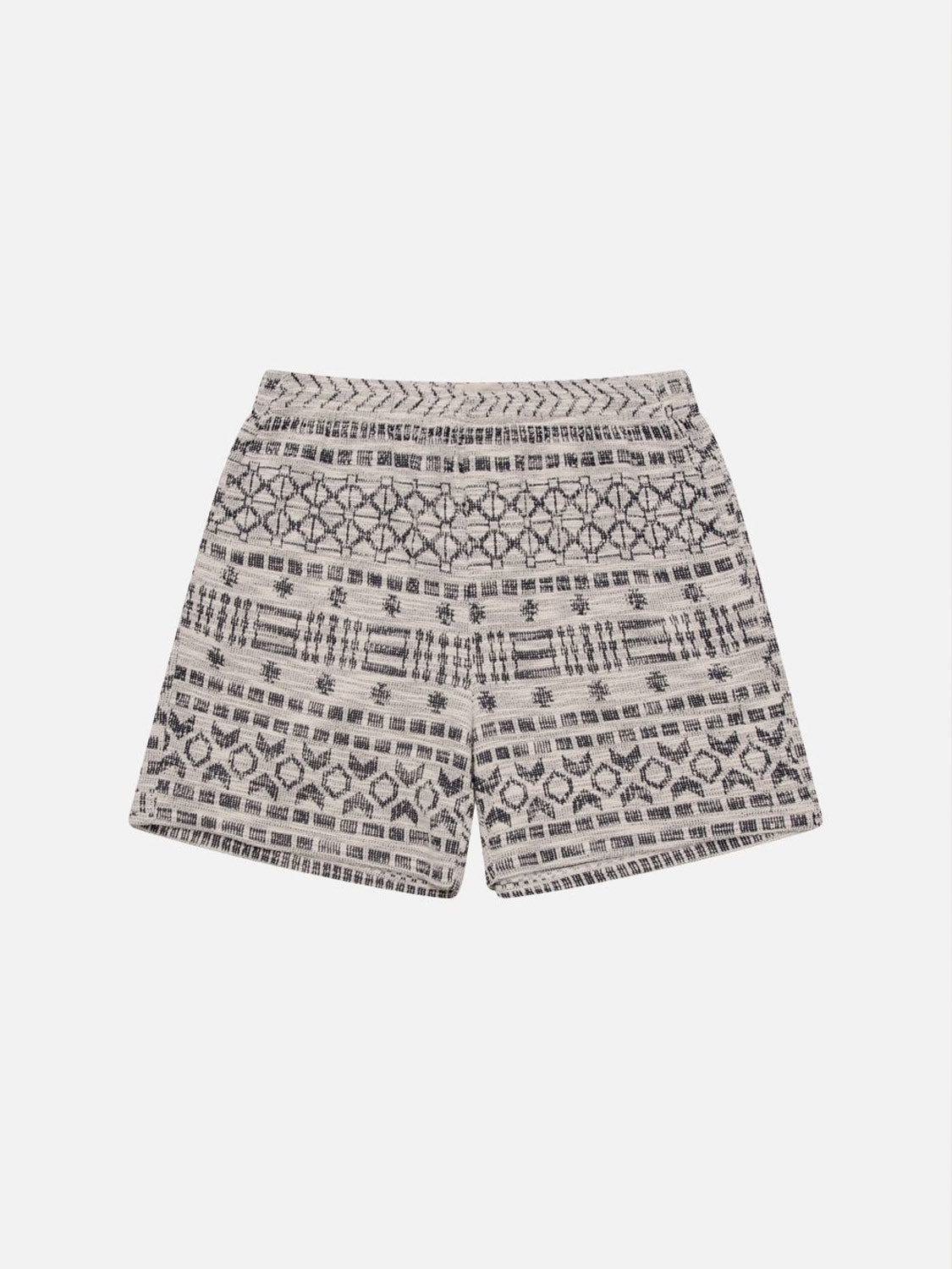The Kuwalla Jacquard Tribal Short features gray fabric with black geometric tribal designs, giving a woven texture appearance. Crafted from high-quality materials, these comfortable and versatile shorts are displayed flat on a white background.