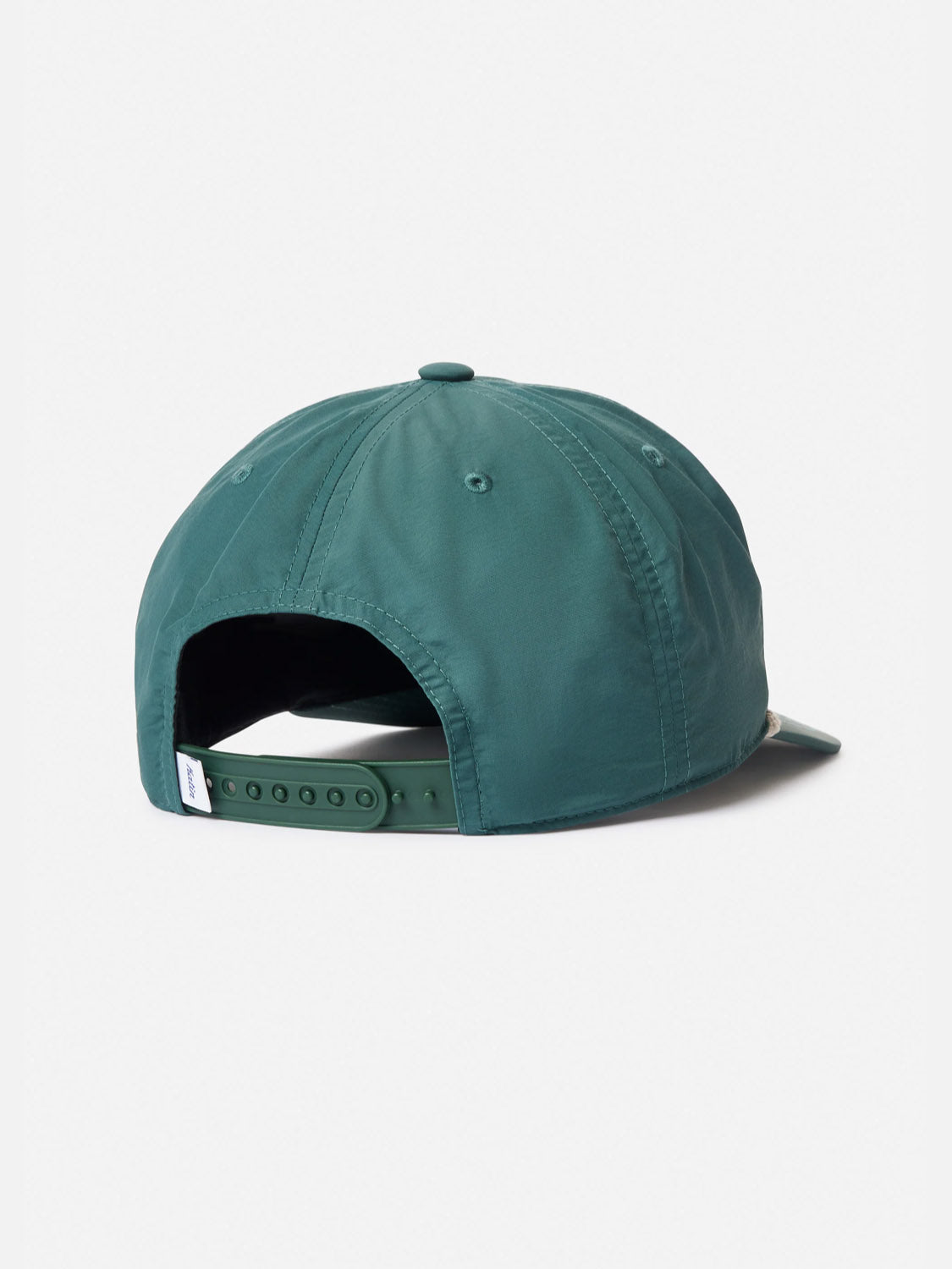 The Katin Largo Hat is a green 5-panel cap seen from the back, with an adjustable snapback closure and a small white tag on the strap, displayed against a plain white background.