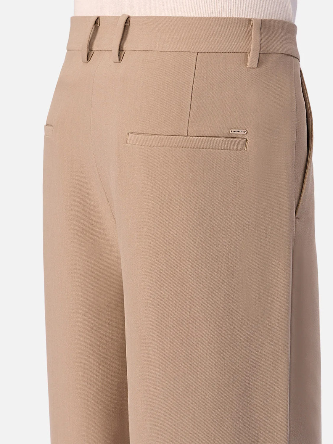 Close-up of the back and side of the Industrie Lightweight Classic Lusso Pant in Stone, with a welt pocket, belt loops, and a tucked-in light shirt—perfect lightweight stretch pants for refined comfort.