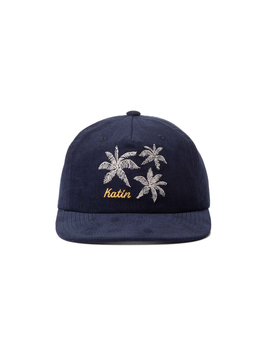 The Katin Mai Tai Hat is a navy blue baseball cap with custom Katin embroidery in yellow script and palm tree designs. Made from textured cotton corduroy, it features a slightly curved brim and an adjustable snapback closure for comfort.