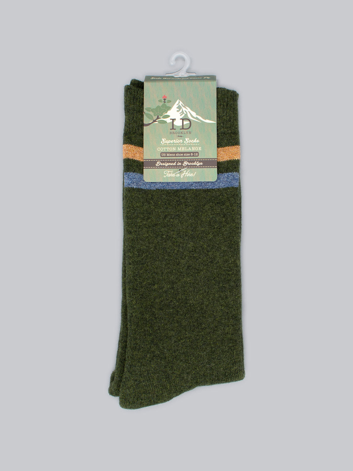 A pair of Rutland Cotton Melange Socks by ID Menswear in green features two stripes—one blue, one orange—near the top and comes packaged with a hanger against a light gray background.
