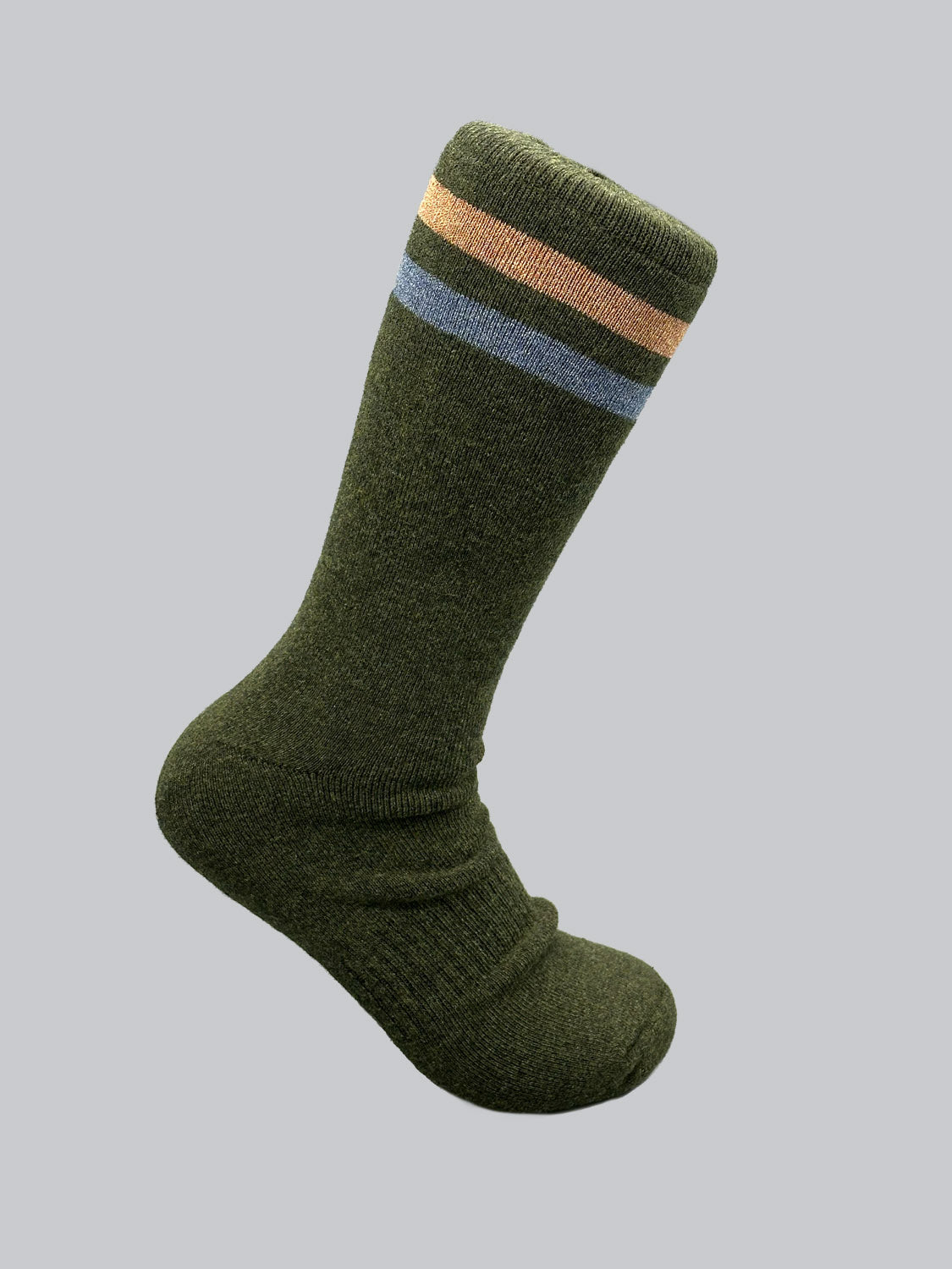 The Rutland Cotton Melange Sock by ID Menswear is a single green sock made from premium cotton, showcasing blue and beige stripes near the top. It stands vertically with the foot pointing left against a light gray background, offering cozy comfort as a winter essential.