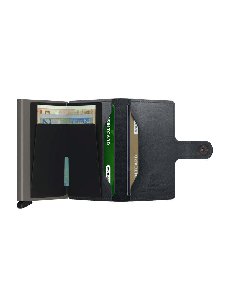 The Secrid Miniwallet Mirum in black leather opens to reveal euro banknotes and cards, organized in slots. It features RFID protection, a left metal section, and a snap button closure on the right.