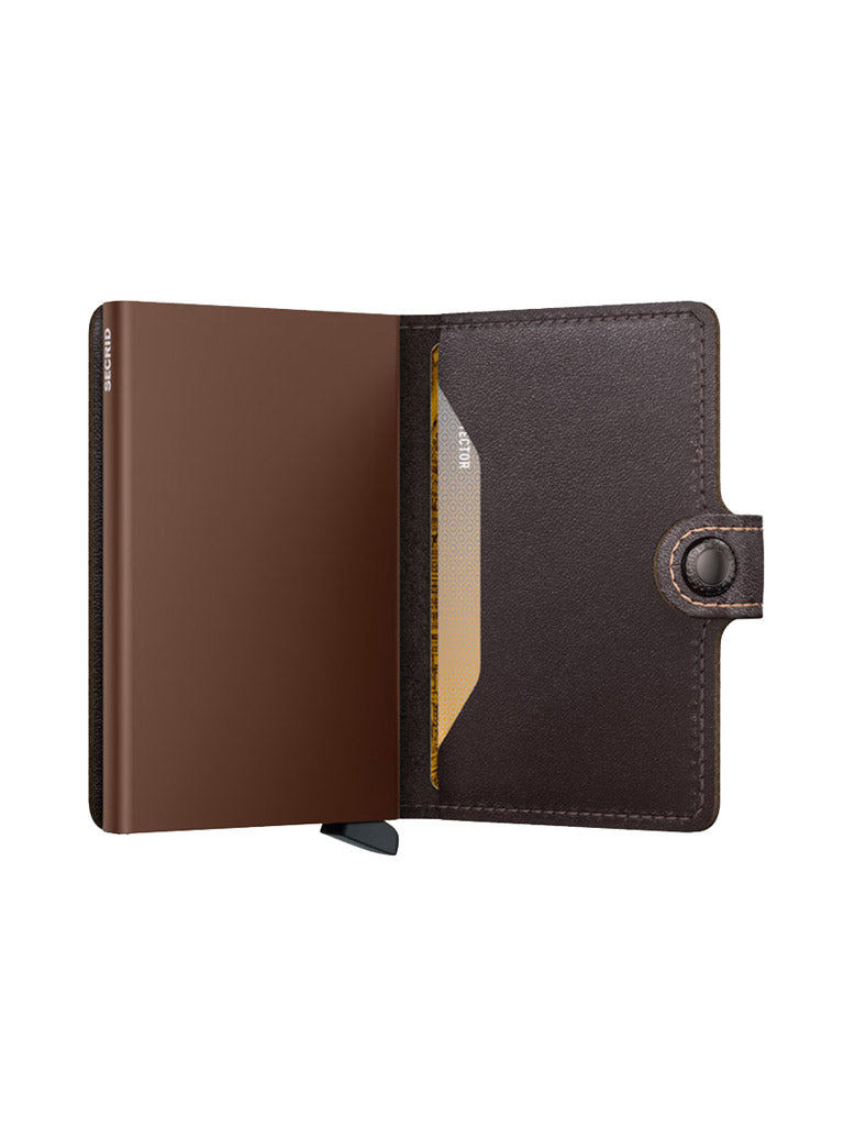 The Secrid Miniwallet Original by Secrid is shown upright on a white background, open to reveal an empty left pocket and a yellow card partly in the right slot. It features a snap closure and provides RFID security for your cards.