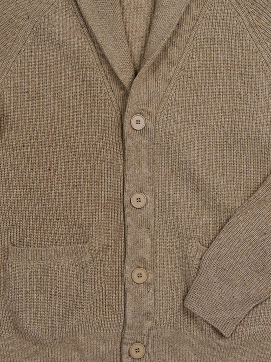 Close-up of the Montreal Merino Wool Cardigan by ID Menswear, in beige speckled yarn with five wooden buttons, two pockets, and a ribbed texture for a cozy, casual look.