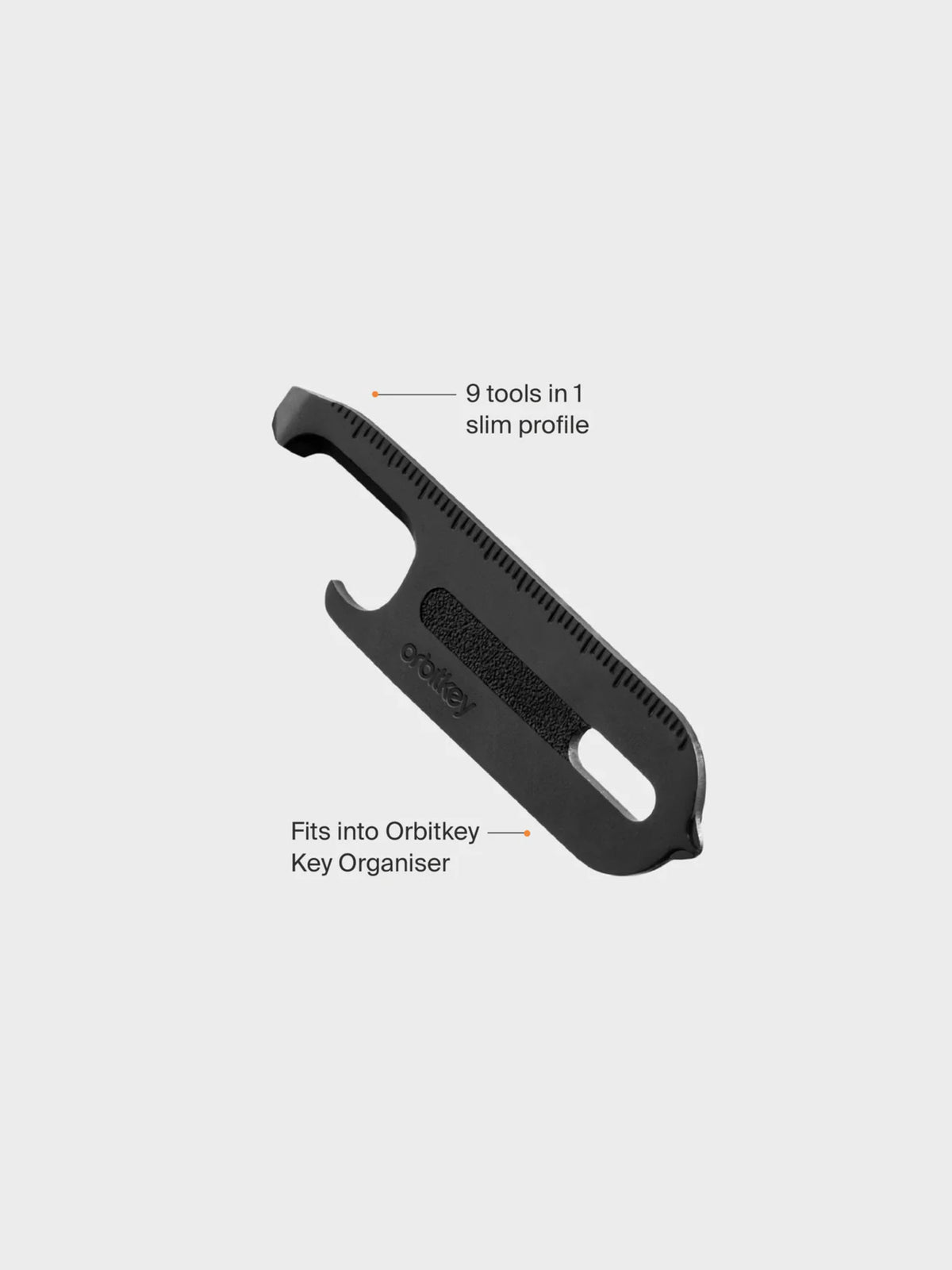 The Orbitkeys Multi Tool V2, a slim black stainless steel 9-in-1 tool with a hooked end and ridged edge, fits perfectly into the Orbitkey Key Organiser and is displayed on a plain light background.