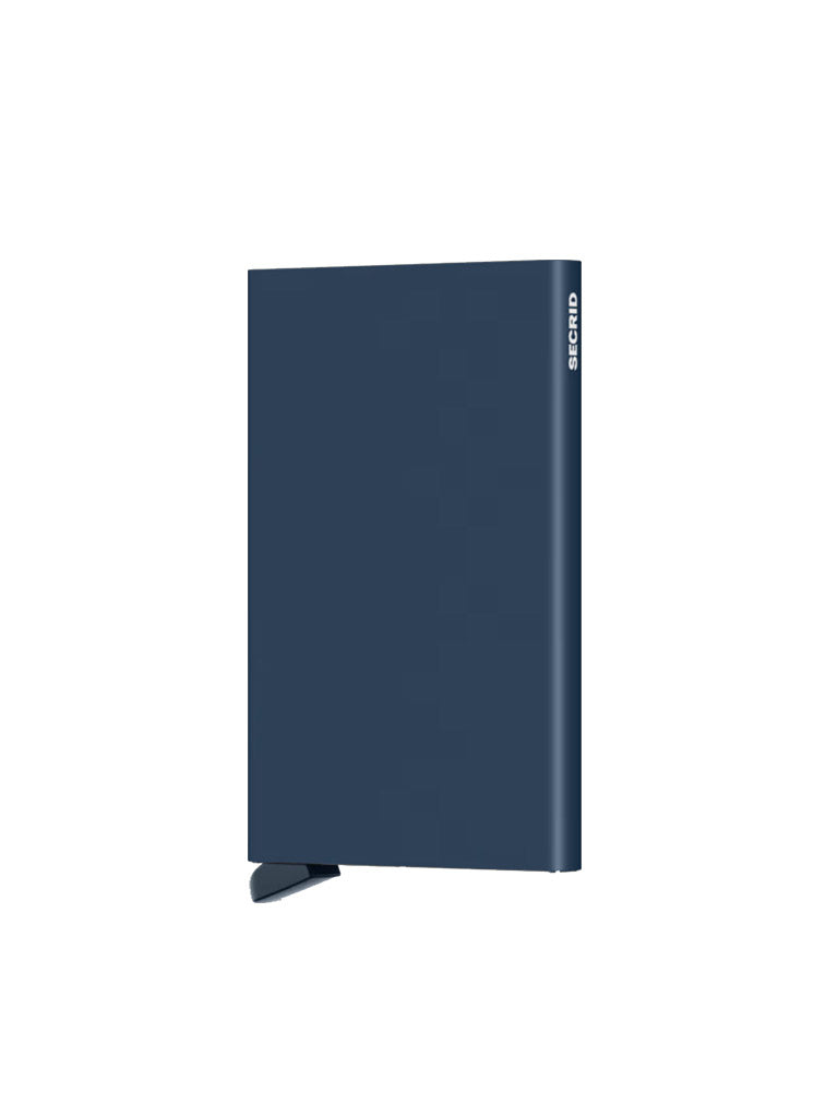 A sleek, dark blue, rectangular Cardprotector Minimal Wallet by Secrid with RFID-safe technology, designed to stand upright on a small black base.
