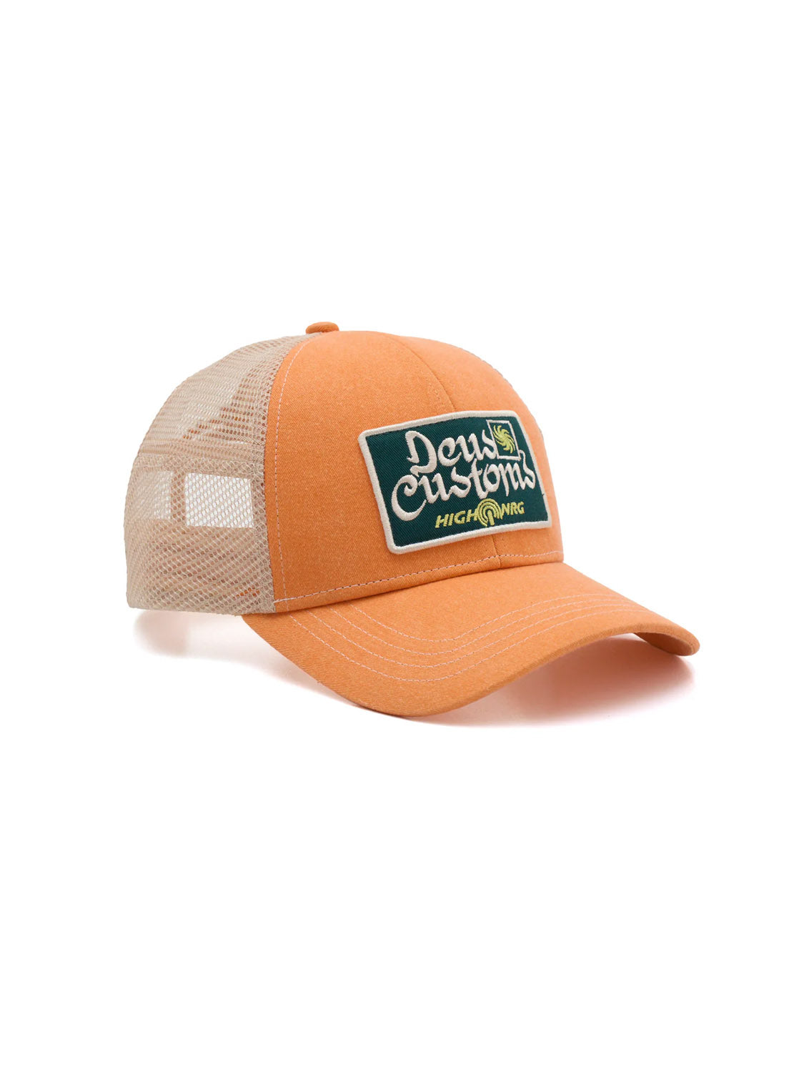 The Deus Open Head Trucker is an orange and beige cotton twill hat with a mesh back and a green front patch that says "Deus Customs Highewing" in white and yellow text.