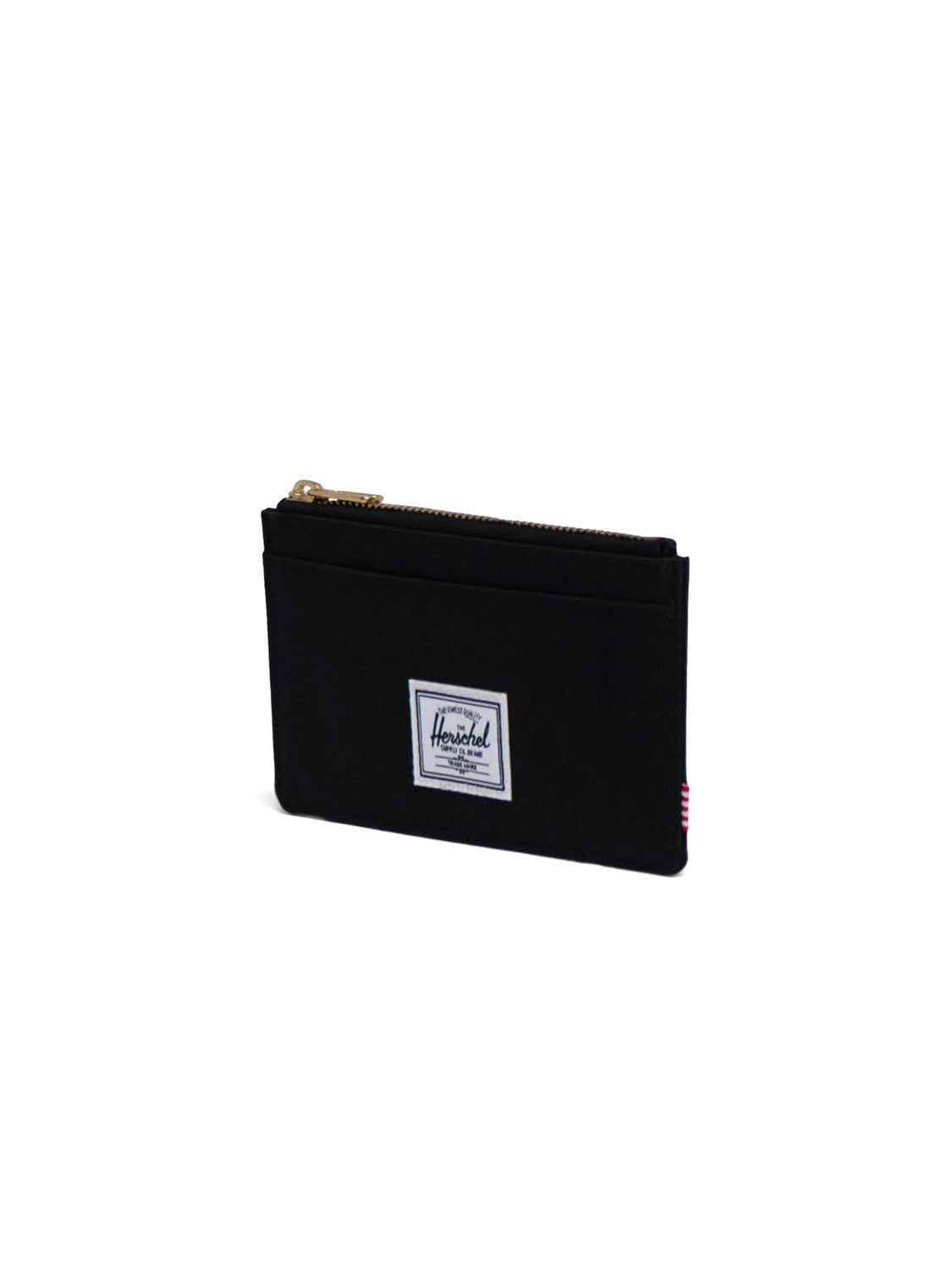 The Oscar Large Cardholder Wallet by Herschel is a black zippered pouch made from recycled polyester, featuring a front pocket and white rectangular brand label, shown on a plain white background.
