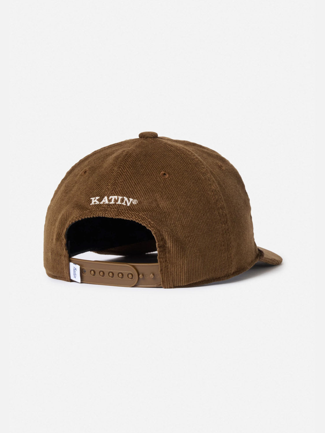 The Katin Peaks Hat, a brown 5-panel cotton corduroy cap, is shown from the back with an adjustable snapback and "KATIN" embroidered in white above the opening, set against a plain light background.