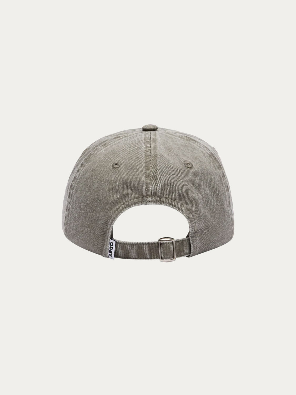The Obey Pigment Bold 6 Panel Strapback is a khaki hat made from 100% cotton, shown from the back with a metal adjustable strap and a small white tag on the left side. The background is plain white.