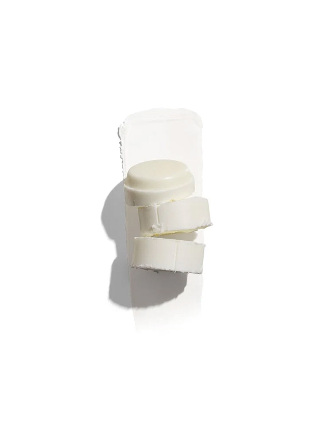 The Jack Black JackZen™ Pit Boss® Antiperspirant & Deodorant, a white cylindrical stick with a partially broken applicator, stands upright on a white background, casting a faint shadow.