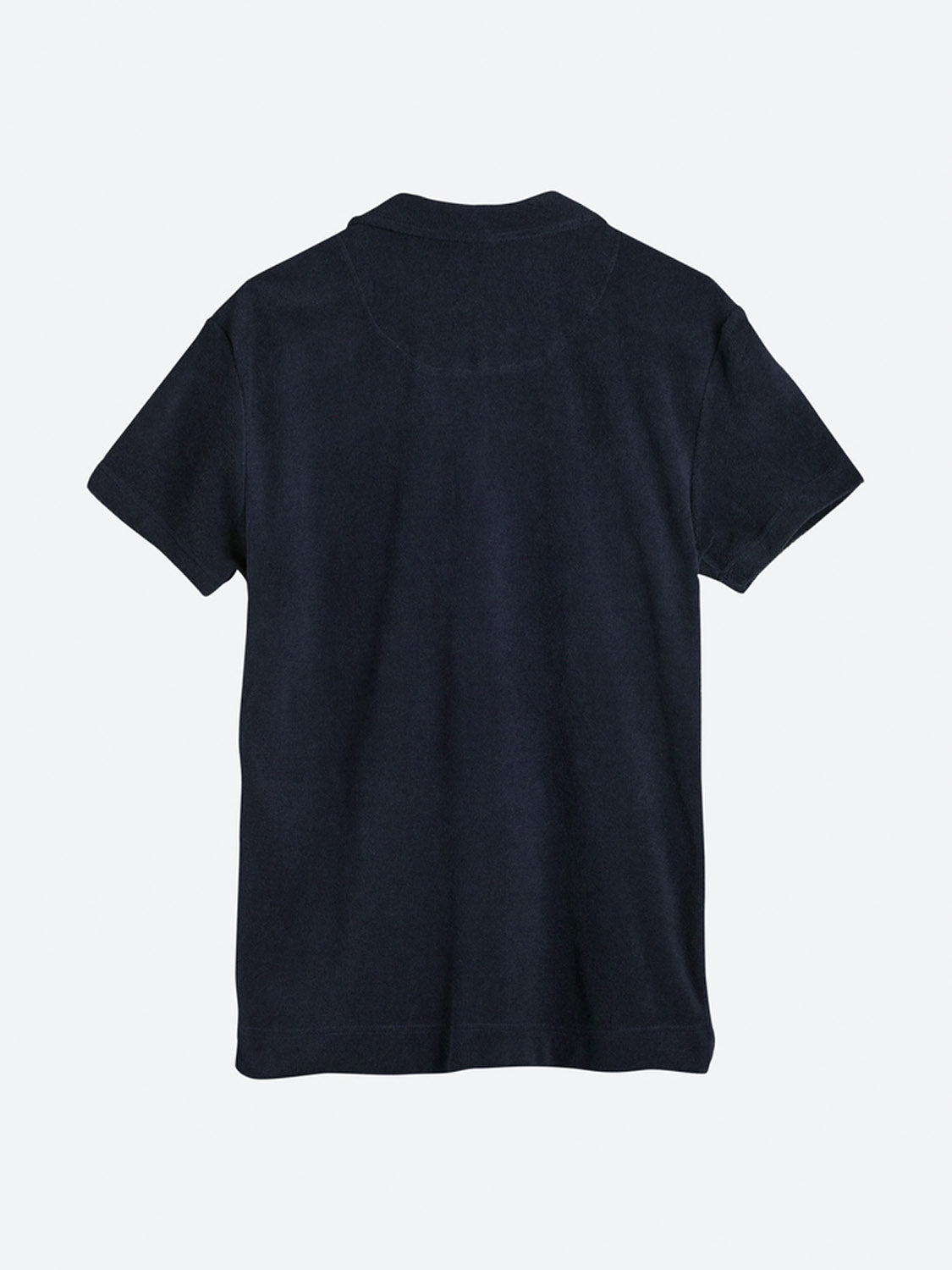 Back view of the OAS Polo Terry Shirt in dark navy, featuring short sleeves and breathable cotton terrycloth fabric, laid flat on a light background.