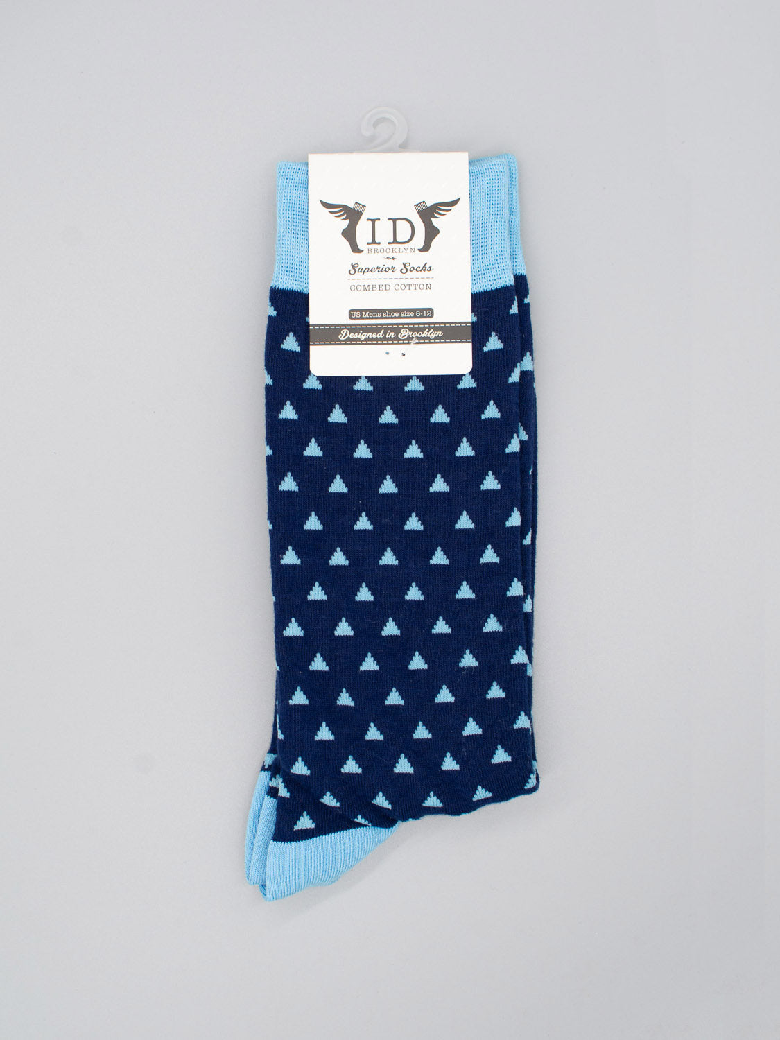 Polygon Graphic Socks by ID Menswear: navy blue socks with light blue triangle patterns, cuffs, toes, and heels. Made from premium combed cotton for comfort. Fits men’s shoe size 8–12; shown with white ID Superior Socks label on grey background.