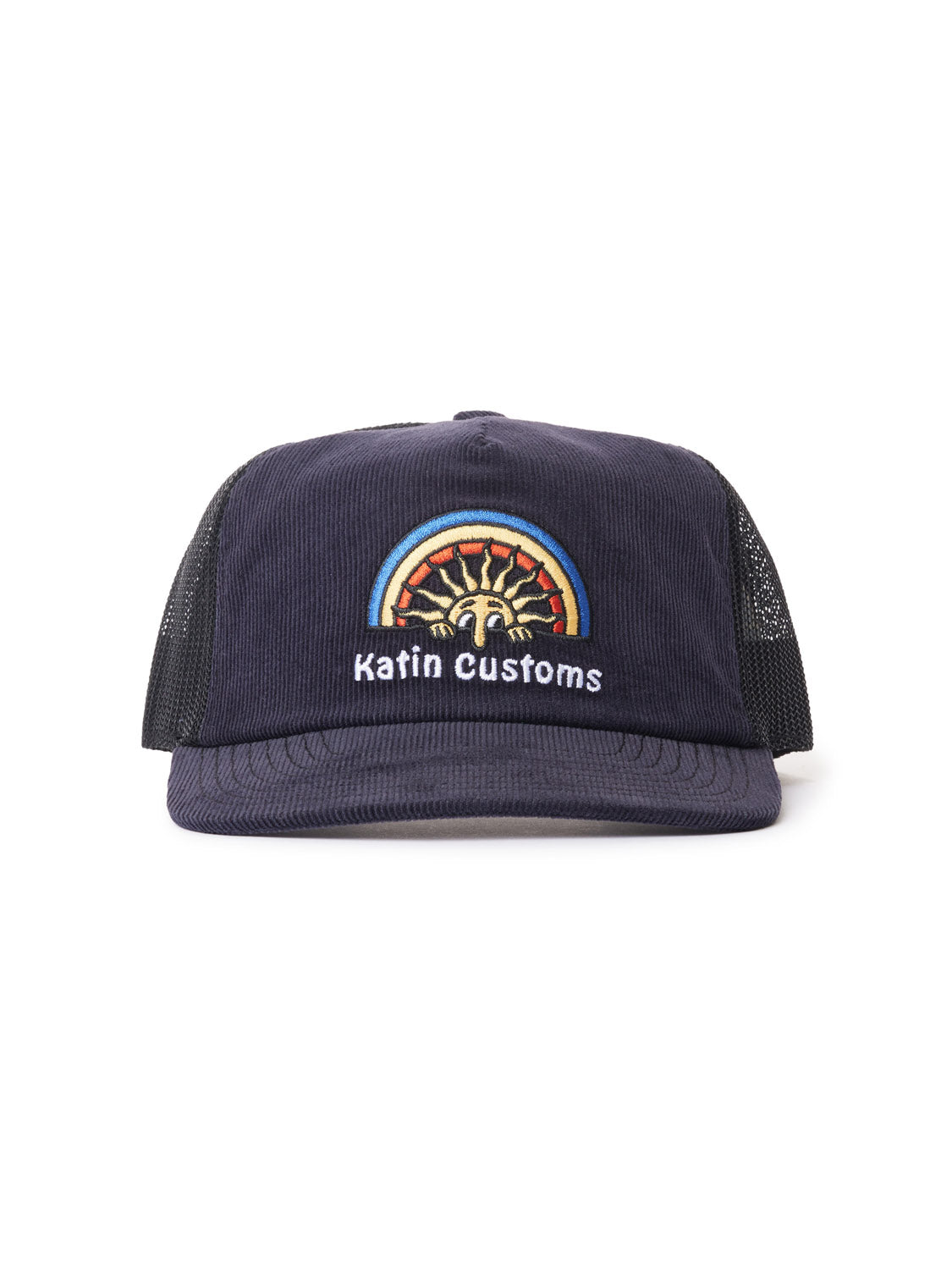 The Katin Rainroy Corduroy Trucker Hat features a navy blue cotton corduroy body with a black mesh back. The front displays an embroidered round sunset over waves design, with Katin Customs in white beneath it.
