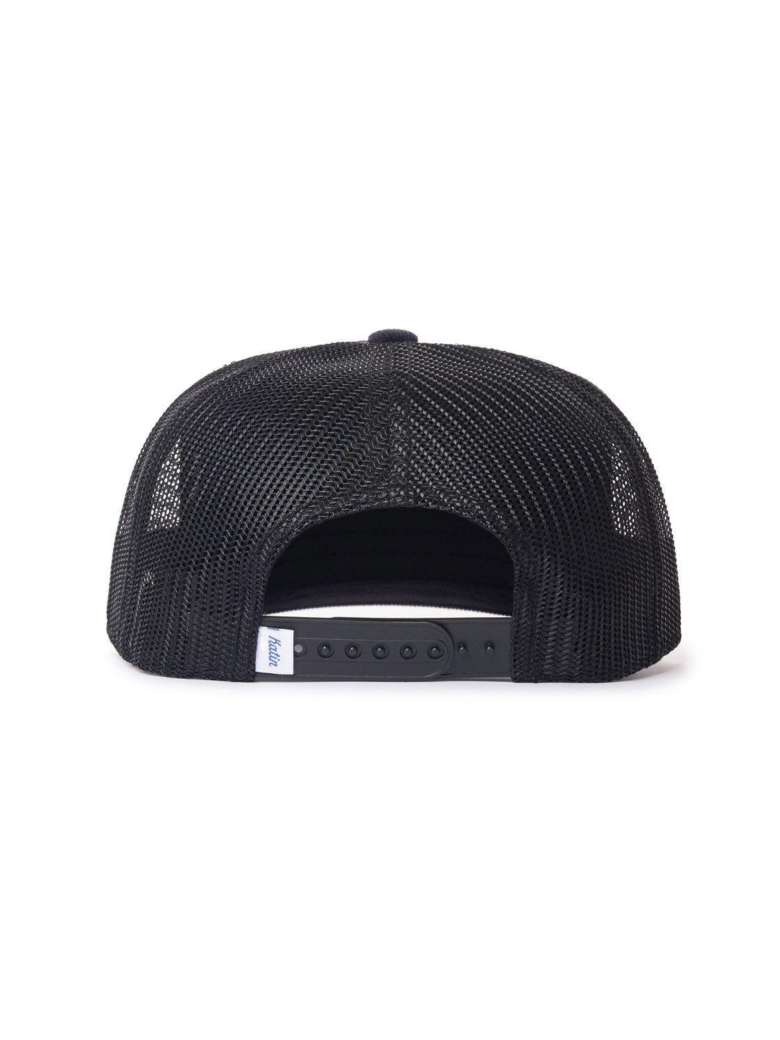The image shows the Katin Rainroy Corduroy Trucker Hats back, showcasing a black mesh design with an adjustable snapback and a small white strap tag. This hat, by Katin, combines style and comfort while offering ventilation throughout the day.