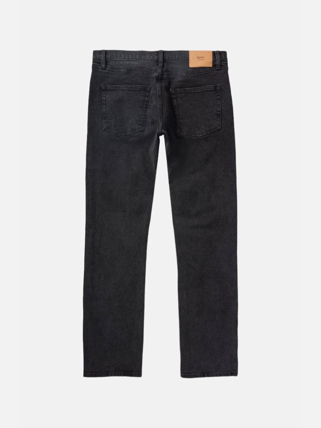 The Katin Ren 57 Classic Straight Pants are black jeans with a straight-leg cut, 5-pocket styling, and a brown leather patch on the waistband, shown from the back and laid flat on a white background.