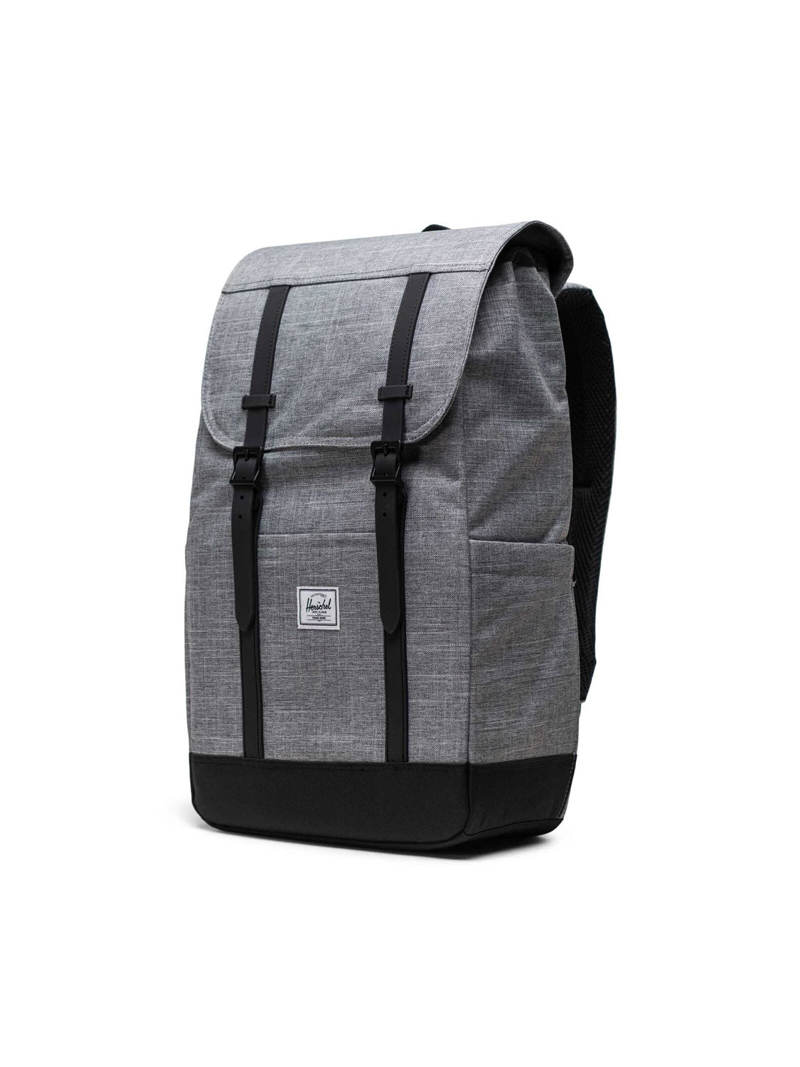 The Herschel Retreat Backpack is made from recycled grey fabric with black straps and accents. It features a front flap with buckle closures, side pockets, and a small rectangular logo patch, shown against a white background.