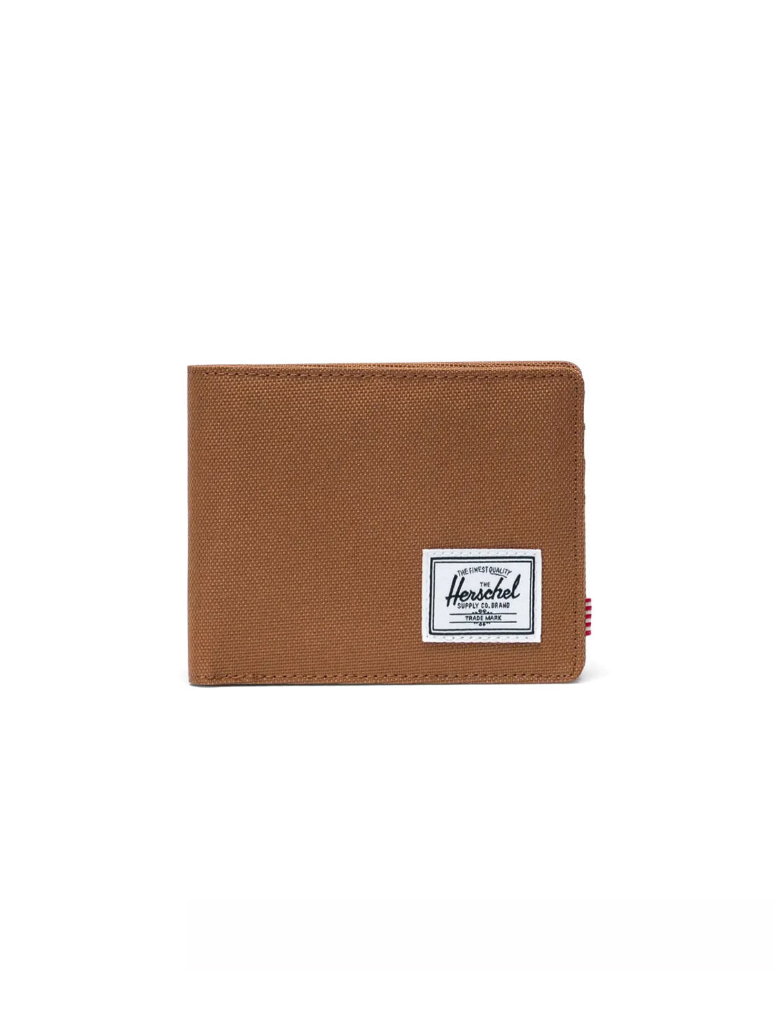 The Herschel Roy Classic Folded Wallet, made from brown fabric with a white rectangular Herschel label on the front, is shown against a plain white background.
