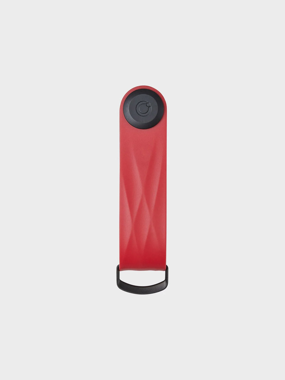 The Orbitkeys Key Organizer Rubber Active is a red, slim, durable key holder with a textured surface, black circular button on top, and black loop at the bottom, shown on a plain white background.