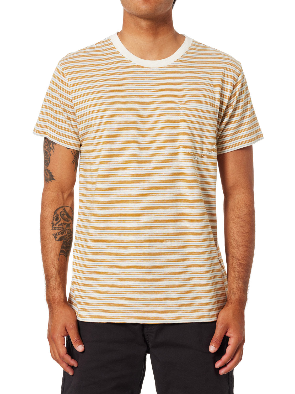 A person wearing a cream and yellow Katin Rural Pocket Tee, made from premium cotton, stands facing forward with arms relaxed at their sides. Their forearm tattoos complement dark pants against a plain white background.