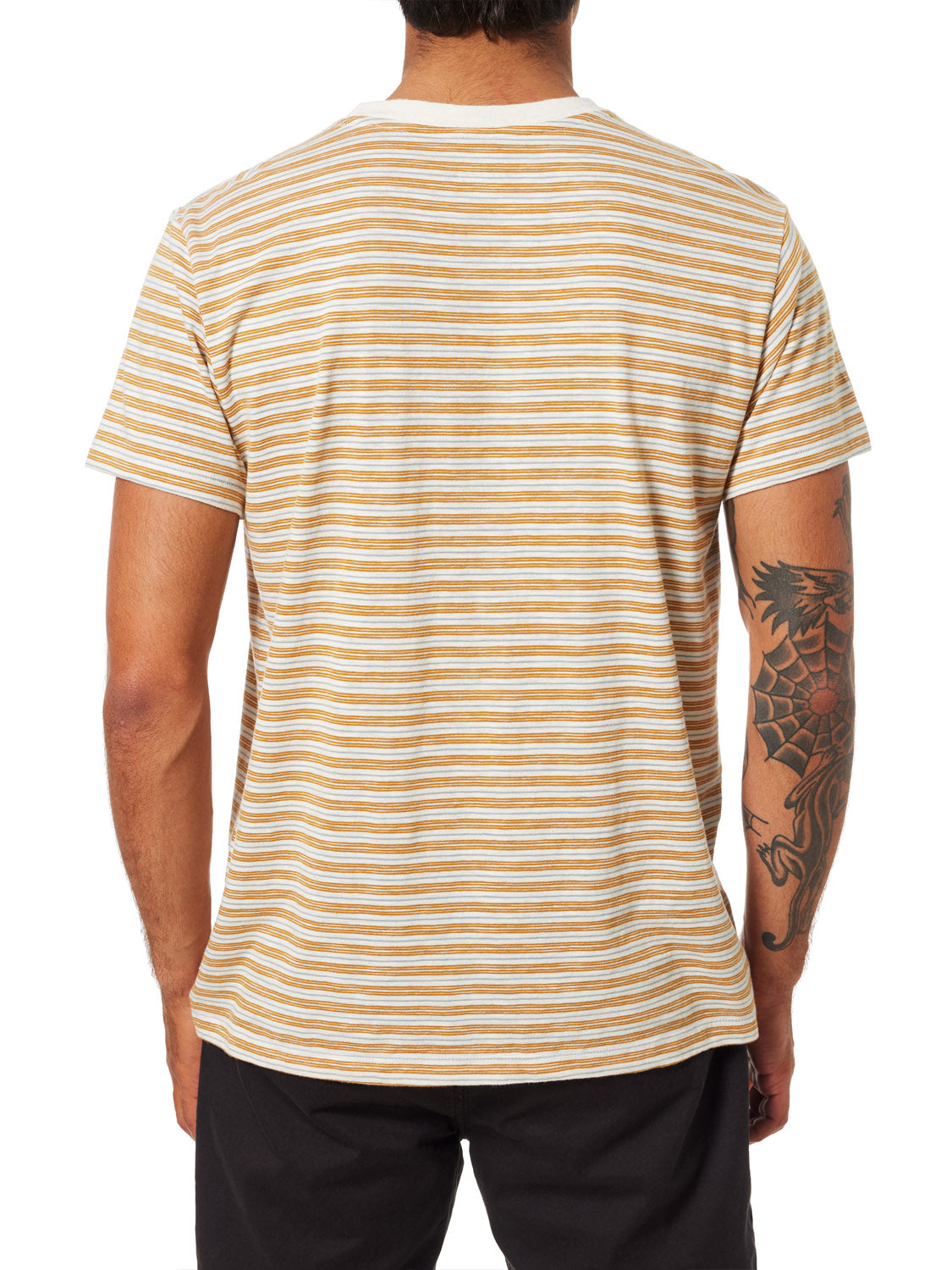 Facing away, someone in black pants wears Katins short-sleeved Rural Pocket Tee, showcasing its yellow and white stripe knit design. Tattoo designs adorn their right arm, while the premium cotton tee highlights their short dark hair.