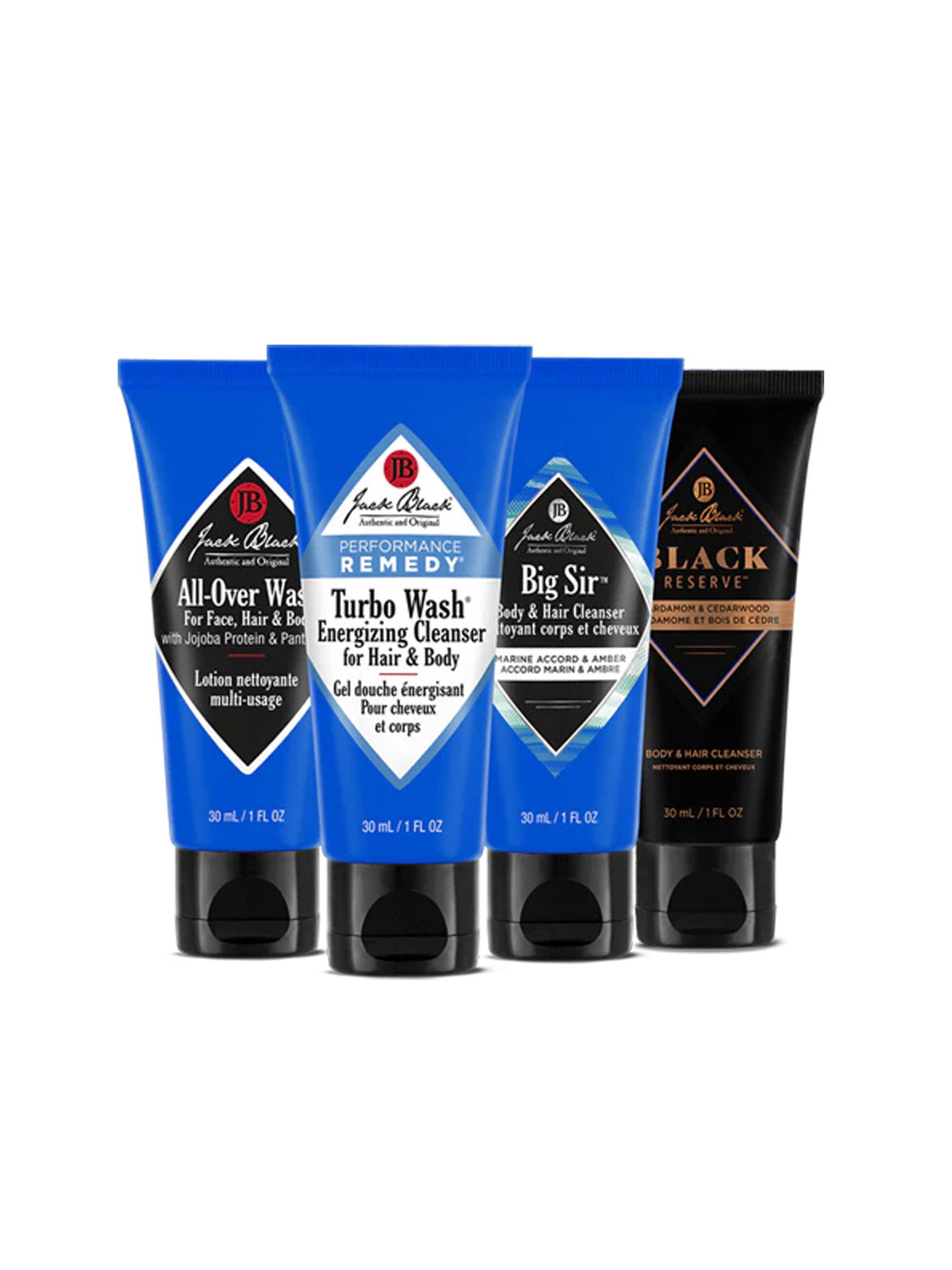 Four travel-sized tubes from the Jack Black Scents of Discovery Body Wash Set stand upright in a row, each with blue or black packaging and unique labels, featuring moisturizing, sulfate-free formulas on a white background.