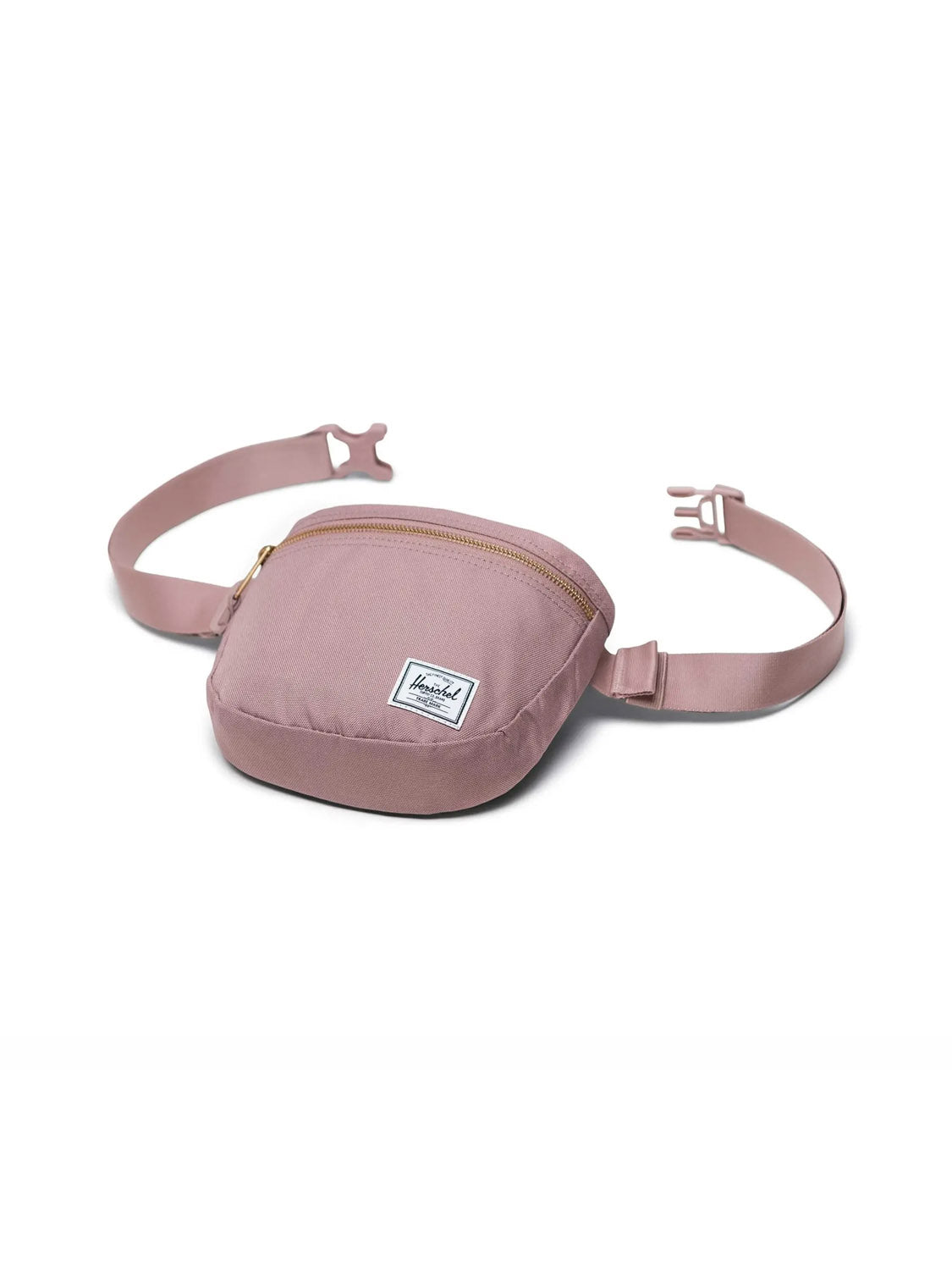 The Herschel Settlement Hip Pack in light pink is made from recycled fabric and features an adjustable strap, plastic buckle, zippered main compartment, and a white logo patch—ideal for hands-free travel.