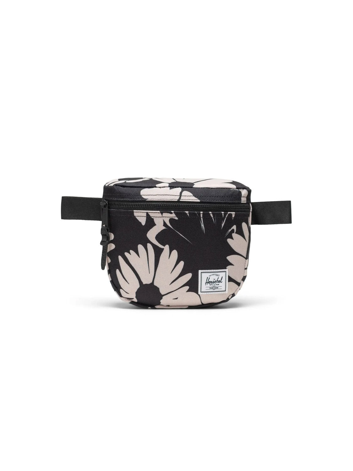 The Herschel Settlement Hip Pack - 2L is a black recycled polyester hip pack with a white floral print, front zipper, and Herschel label for hands-free convenience. Shown on a plain white background.