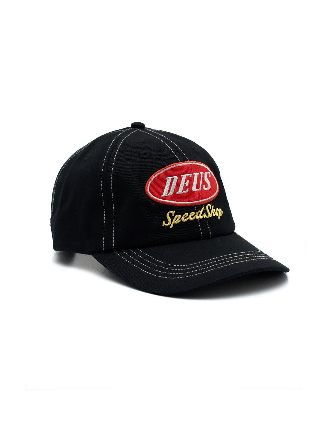 The Deus Speedshop Cap is a black cotton twill dad cap with white stitching, a red oval DEUS patch, yellow Speed Shop embroidery, and an adjustable strapback closure.